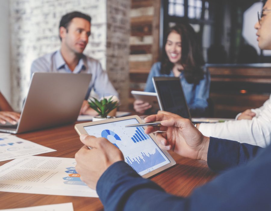 Group-of-people-meeting-with-technology-scaled